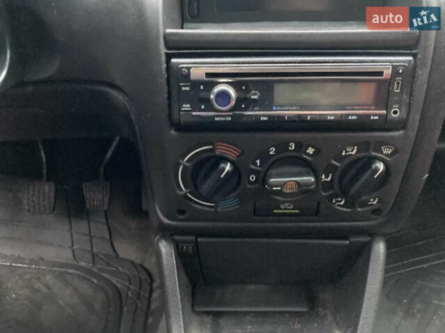 Красный Опель Астра, объемом двигателя 1.6 л и пробегом 265 тыс. км за 1200 $, фото 1 на Automoto.ua