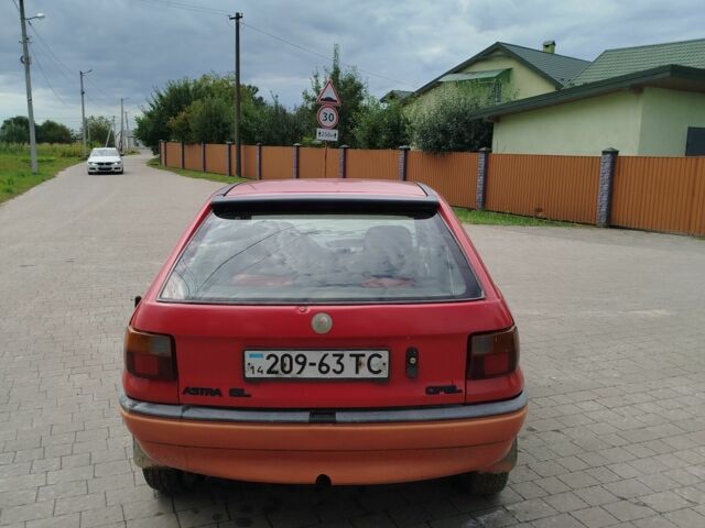 Красный Опель Астра, объемом двигателя 1.4 л и пробегом 443 тыс. км за 600 $, фото 4 на Automoto.ua