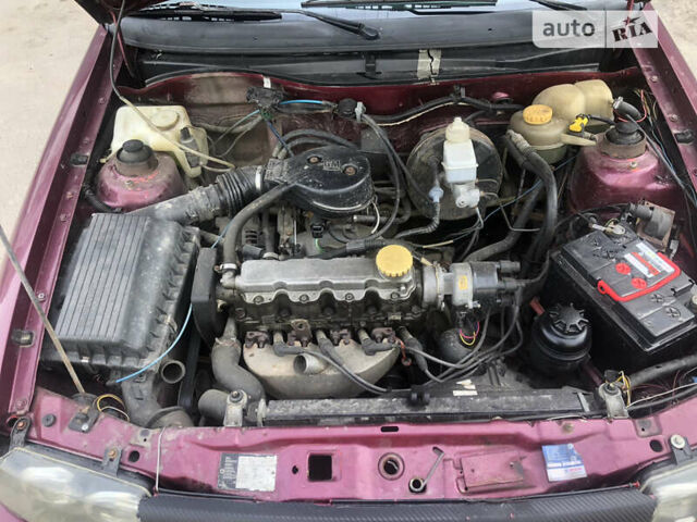 Червоний Опель Астра, об'ємом двигуна 1.39 л та пробігом 420 тис. км за 1700 $, фото 8 на Automoto.ua
