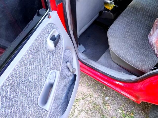 Красный Опель Астра, объемом двигателя 1.6 л и пробегом 200 тыс. км за 1850 $, фото 4 на Automoto.ua