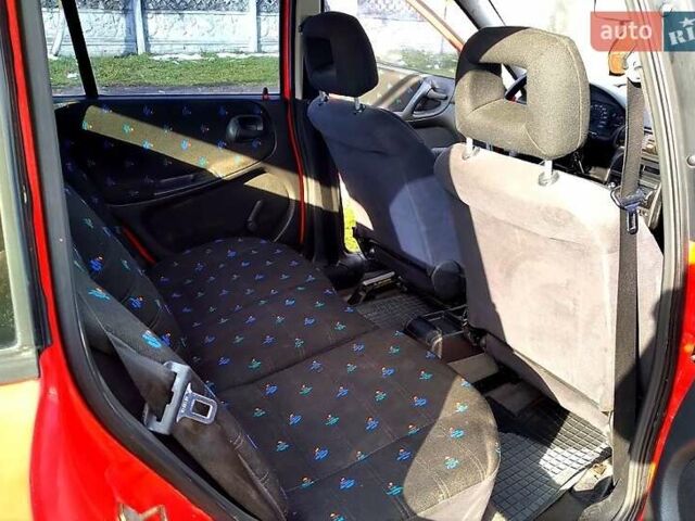 Червоний Опель Астра, об'ємом двигуна 1.6 л та пробігом 226 тис. км за 2500 $, фото 3 на Automoto.ua