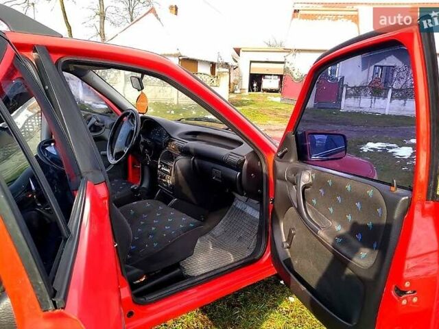 Червоний Опель Астра, об'ємом двигуна 1.6 л та пробігом 226 тис. км за 2500 $, фото 4 на Automoto.ua