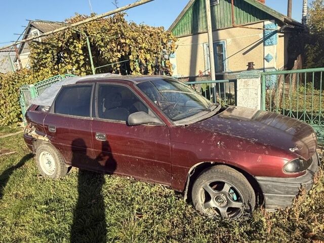 Красный Опель Астра, объемом двигателя 1.6 л и пробегом 400 тыс. км за 550 $, фото 1 на Automoto.ua