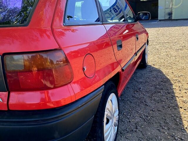 Червоний Опель Астра, об'ємом двигуна 1.4 л та пробігом 348 тис. км за 2500 $, фото 4 на Automoto.ua