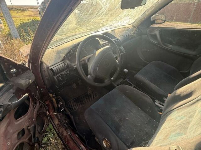 Красный Опель Астра, объемом двигателя 1.6 л и пробегом 400 тыс. км за 550 $, фото 6 на Automoto.ua