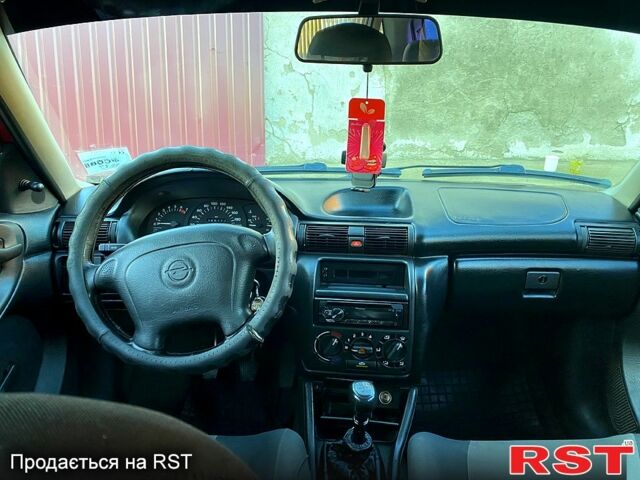 Червоний Опель Астра, об'ємом двигуна 1.4 л та пробігом 348 тис. км за 2500 $, фото 6 на Automoto.ua