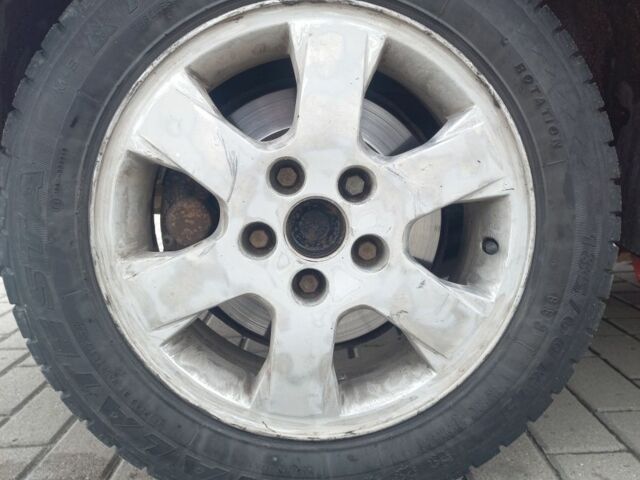 Красный Опель Астра, объемом двигателя 1.6 л и пробегом 396 тыс. км за 1299 $, фото 4 на Automoto.ua