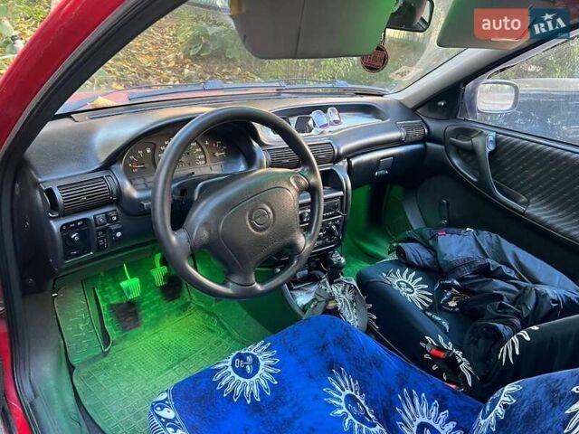Опель Астра 1997 в Тернополе на Automoto.ua Красный Опель Астра, объемом двигателя 1.4 л и пробегом 200 тыс. км за 1900 $, фото 7 на Automoto.ua