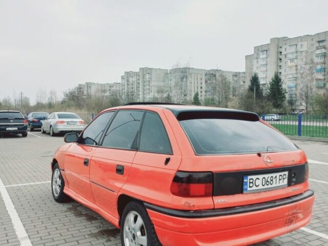 Красный Опель Астра, объемом двигателя 1.6 л и пробегом 396 тыс. км за 1299 $, фото 1 на Automoto.ua
