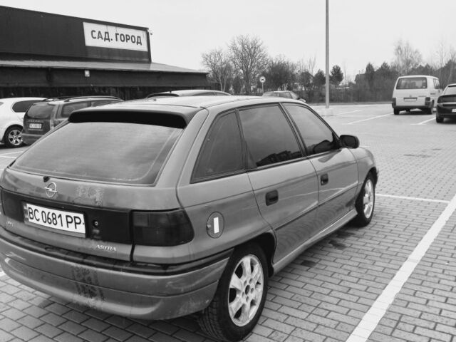 Красный Опель Астра, объемом двигателя 1.6 л и пробегом 396 тыс. км за 1299 $, фото 5 на Automoto.ua