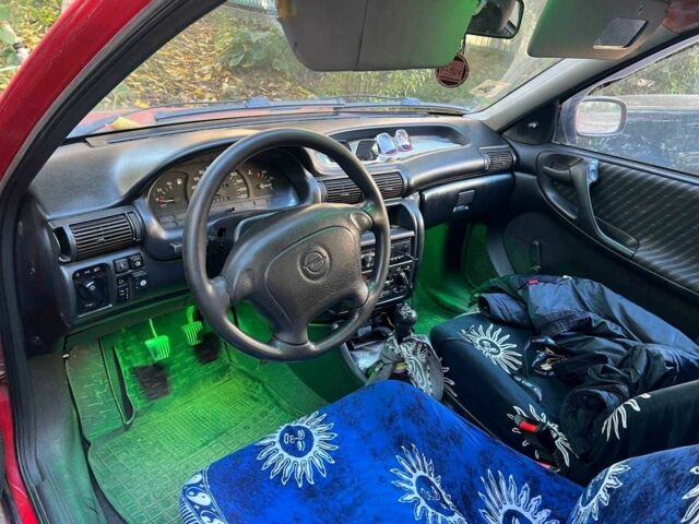 Опель Астра 1997 в Тернополе на Automoto.ua Красный Опель Астра, объемом двигателя 1.4 л и пробегом 200 тыс. км за 1900 $, фото 7 на Automoto.ua