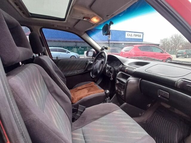 Красный Опель Астра, объемом двигателя 1.6 л и пробегом 396 тыс. км за 1299 $, фото 11 на Automoto.ua