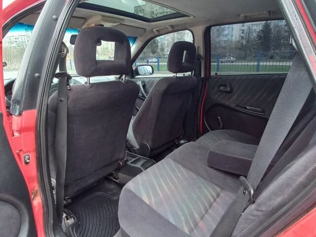 Красный Опель Астра, объемом двигателя 1.6 л и пробегом 396 тыс. км за 1299 $, фото 6 на Automoto.ua