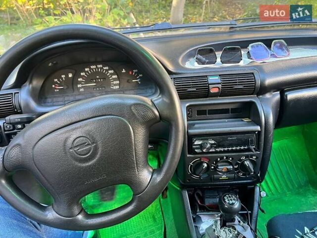 Опель Астра 1997 в Тернополе на Automoto.ua Красный Опель Астра, объемом двигателя 1.4 л и пробегом 200 тыс. км за 1900 $, фото 2 на Automoto.ua