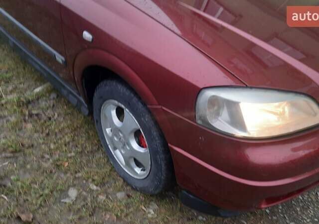 Красный Опель Астра, объемом двигателя 1.6 л и пробегом 250 тыс. км за 2700 $, фото 24 на Automoto.ua