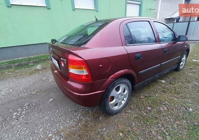 Красный Опель Астра, объемом двигателя 1.6 л и пробегом 250 тыс. км за 2700 $, фото 11 на Automoto.ua