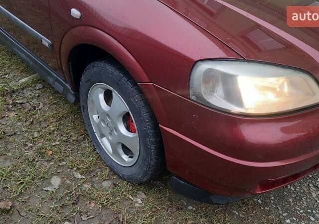 Красный Опель Астра, объемом двигателя 1.6 л и пробегом 250 тыс. км за 2700 $, фото 23 на Automoto.ua