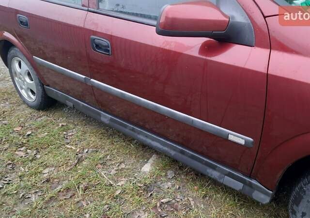 Красный Опель Астра, объемом двигателя 1.6 л и пробегом 250 тыс. км за 2700 $, фото 21 на Automoto.ua