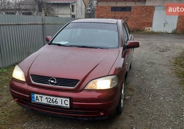 Красный Опель Астра, объемом двигателя 1.6 л и пробегом 250 тыс. км за 2700 $, фото 9 на Automoto.ua