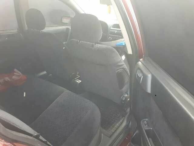 Красный Опель Астра, объемом двигателя 1.6 л и пробегом 181 тыс. км за 4900 $, фото 6 на Automoto.ua