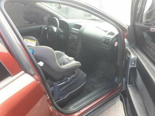 Красный Опель Астра, объемом двигателя 1.6 л и пробегом 181 тыс. км за 4900 $, фото 4 на Automoto.ua