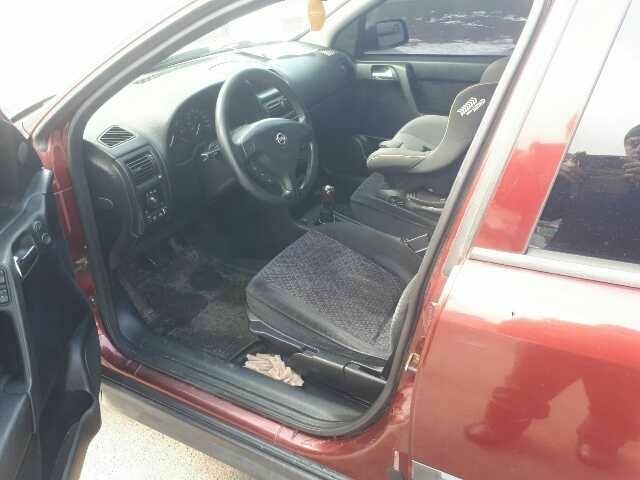 Красный Опель Астра, объемом двигателя 1.6 л и пробегом 181 тыс. км за 4900 $, фото 5 на Automoto.ua