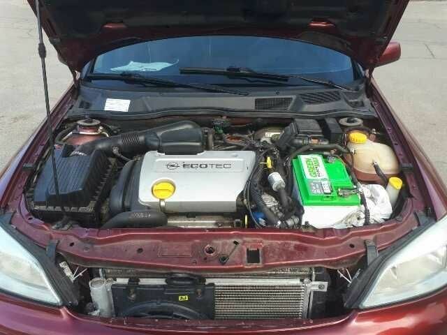 Красный Опель Астра, объемом двигателя 1.6 л и пробегом 181 тыс. км за 4900 $, фото 7 на Automoto.ua