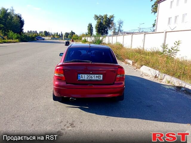 Красный Опель Астра, объемом двигателя 1.6 л и пробегом 536 тыс. км за 1660 $, фото 1 на Automoto.ua