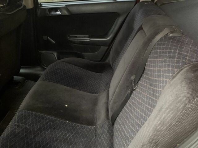 Красный Опель Астра, объемом двигателя 1.4 л и пробегом 3 тыс. км за 2300 $, фото 4 на Automoto.ua