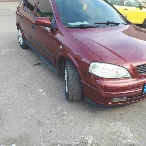 Красный Опель Астра, объемом двигателя 1.6 л и пробегом 181 тыс. км за 4900 $, фото 2 на Automoto.ua