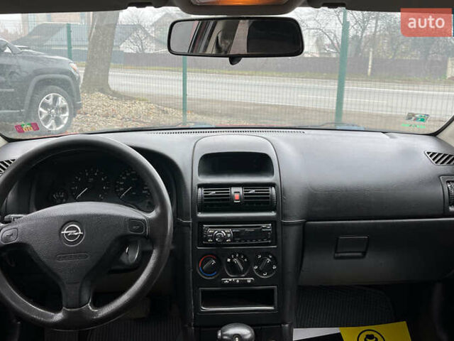 Красный Опель Астра, объемом двигателя 1.6 л и пробегом 294 тыс. км за 3699 $, фото 10 на Automoto.ua