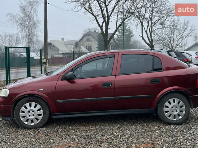 Красный Опель Астра, объемом двигателя 1.6 л и пробегом 294 тыс. км за 3699 $, фото 3 на Automoto.ua