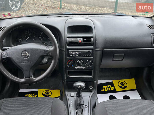 Красный Опель Астра, объемом двигателя 1.6 л и пробегом 294 тыс. км за 3699 $, фото 9 на Automoto.ua