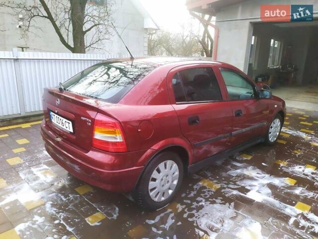 Красный Опель Астра, объемом двигателя 1.6 л и пробегом 293 тыс. км за 3250 $, фото 9 на Automoto.ua