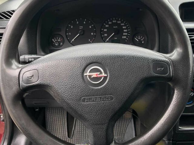 Червоний Опель Астра, об'ємом двигуна 1.6 л та пробігом 294 тис. км за 3699 $, фото 11 на Automoto.ua