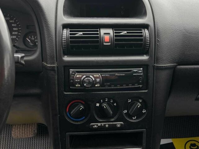 Червоний Опель Астра, об'ємом двигуна 1.6 л та пробігом 294 тис. км за 3699 $, фото 12 на Automoto.ua