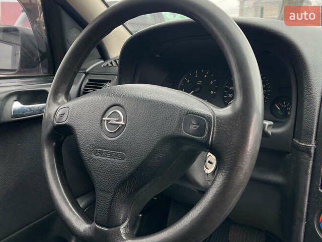 Красный Опель Астра, объемом двигателя 1.6 л и пробегом 294 тыс. км за 3699 $, фото 15 на Automoto.ua