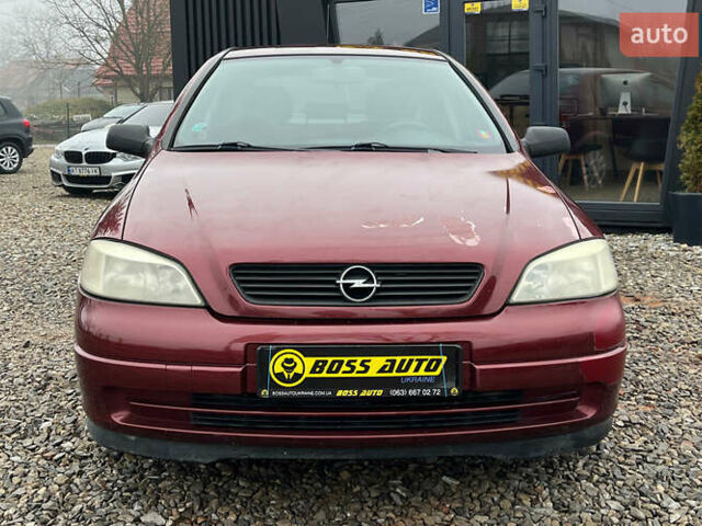 Красный Опель Астра, объемом двигателя 1.6 л и пробегом 294 тыс. км за 3699 $, фото 1 на Automoto.ua