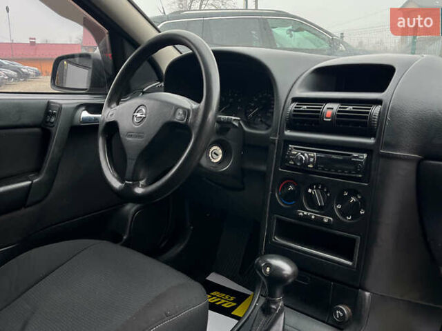 Красный Опель Астра, объемом двигателя 1.6 л и пробегом 294 тыс. км за 3699 $, фото 16 на Automoto.ua