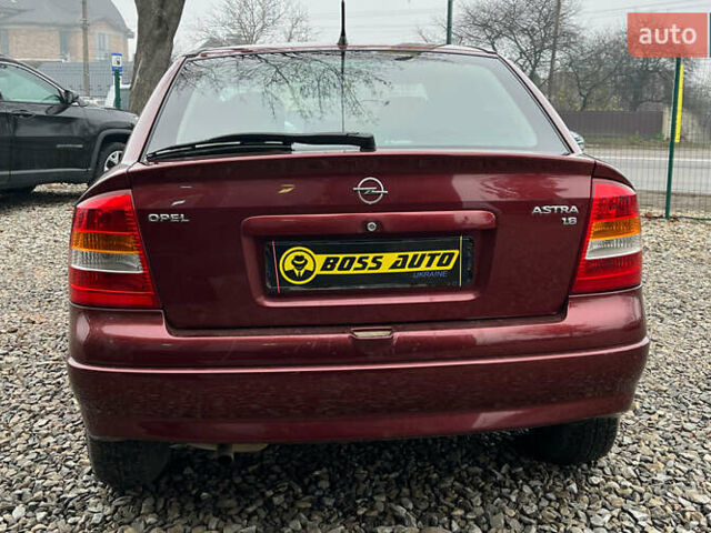 Красный Опель Астра, объемом двигателя 1.6 л и пробегом 294 тыс. км за 3699 $, фото 5 на Automoto.ua