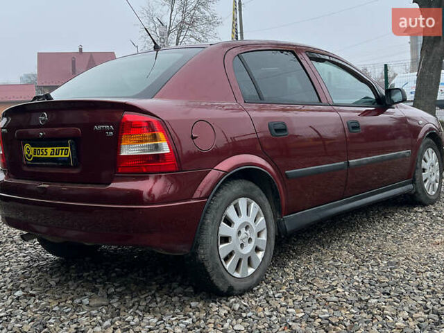 Красный Опель Астра, объемом двигателя 1.6 л и пробегом 294 тыс. км за 3699 $, фото 6 на Automoto.ua