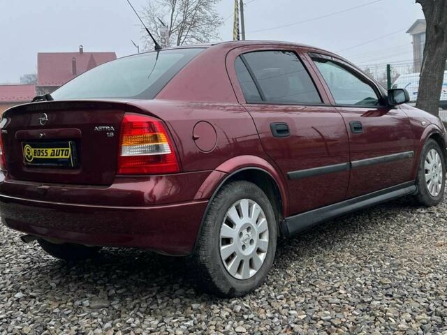 Червоний Опель Астра, об'ємом двигуна 1.6 л та пробігом 294 тис. км за 3699 $, фото 6 на Automoto.ua