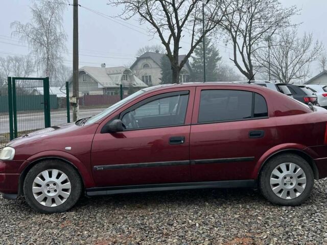 Червоний Опель Астра, об'ємом двигуна 1.6 л та пробігом 294 тис. км за 3699 $, фото 3 на Automoto.ua