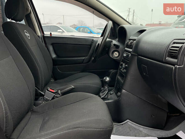 Красный Опель Астра, объемом двигателя 1.6 л и пробегом 294 тыс. км за 3699 $, фото 19 на Automoto.ua