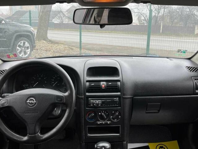 Червоний Опель Астра, об'ємом двигуна 1.6 л та пробігом 294 тис. км за 3699 $, фото 10 на Automoto.ua