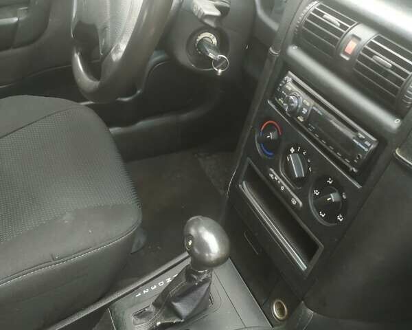 Красный Опель Астра, объемом двигателя 1.6 л и пробегом 293 тыс. км за 3250 $, фото 2 на Automoto.ua