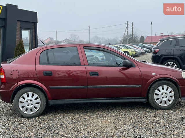 Красный Опель Астра, объемом двигателя 1.6 л и пробегом 294 тыс. км за 3699 $, фото 7 на Automoto.ua