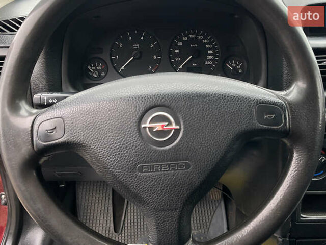 Красный Опель Астра, объемом двигателя 1.6 л и пробегом 294 тыс. км за 3699 $, фото 11 на Automoto.ua