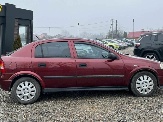 Червоний Опель Астра, об'ємом двигуна 1.6 л та пробігом 294 тис. км за 3699 $, фото 7 на Automoto.ua