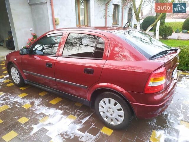 Красный Опель Астра, объемом двигателя 1.6 л и пробегом 293 тыс. км за 3250 $, фото 6 на Automoto.ua